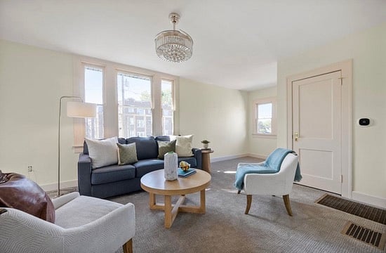Furniture pictured not included. Instead we have a comfy sectional, TV, black out curtains and workspace in the corner.