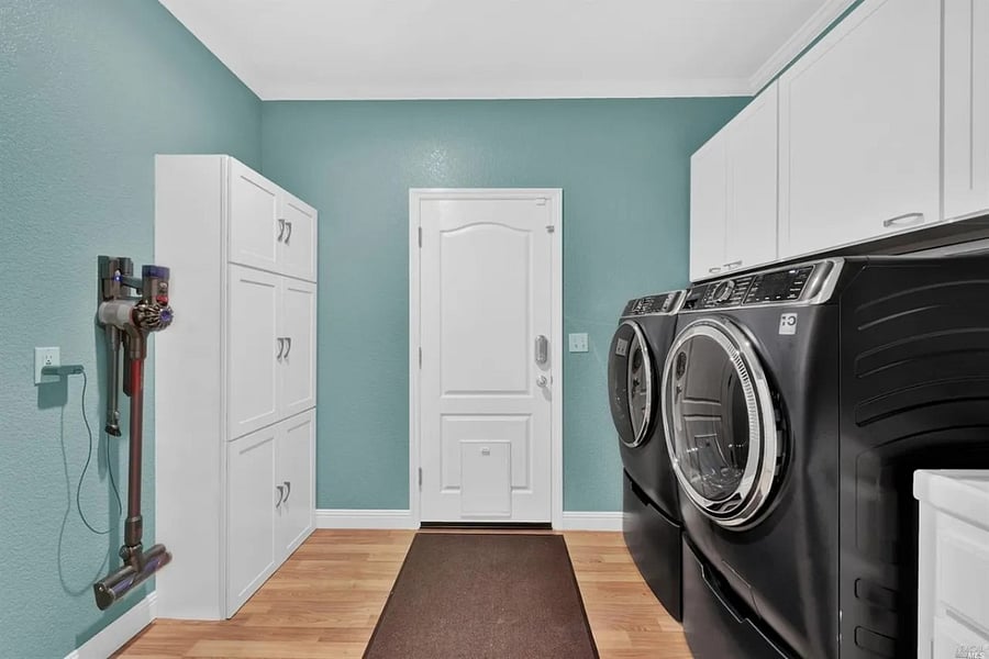 Laundry room and door to the garage