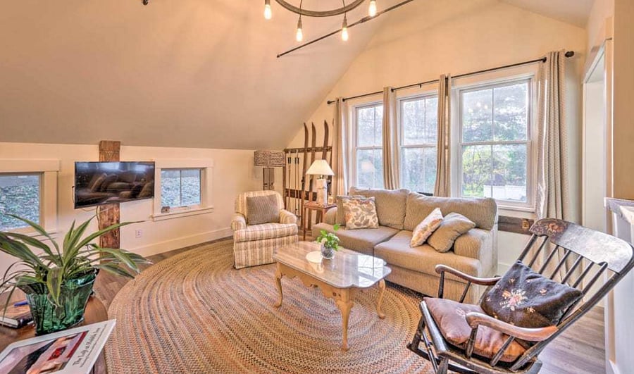 The carefully designed living space features huge windows with black out draperies, smart TV, several comfortable seating options. 