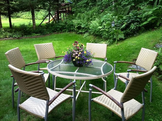 Weather permitting, enjoy this glass top table, shared occasionally by guests in the Inn. A gas grill is also available for your use.