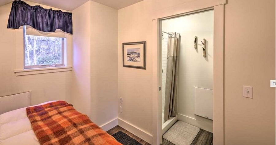 The shower room, off the bedroom has an additional heat source