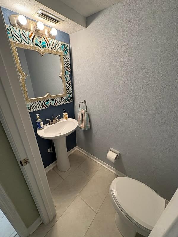 Shared half bath in common area.