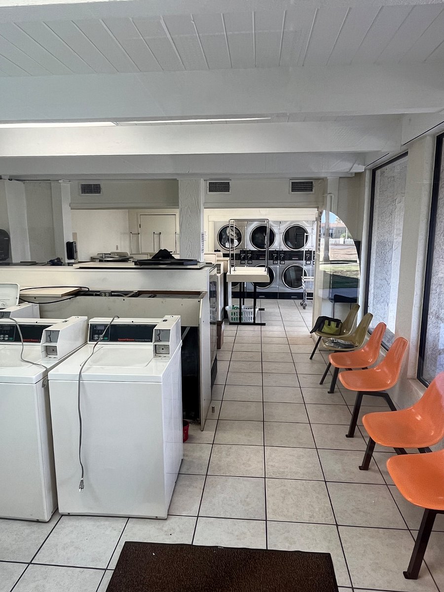 Commercial laundry room available to registered guests