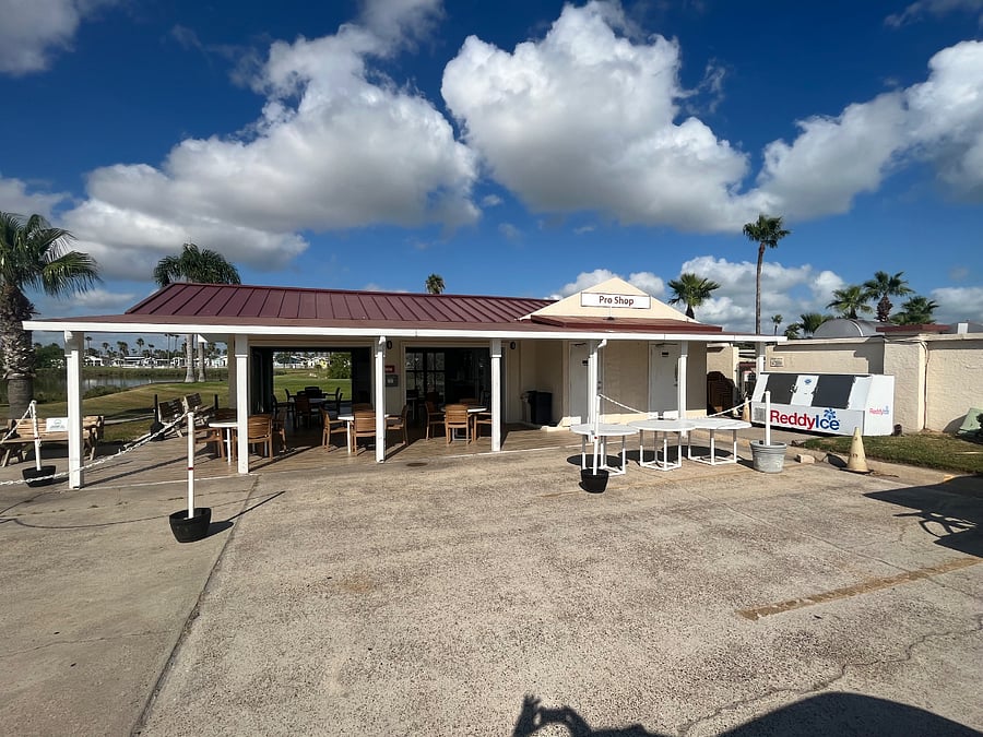 Poolside shaded picnic area. Order meals from the grill or bring your own.
