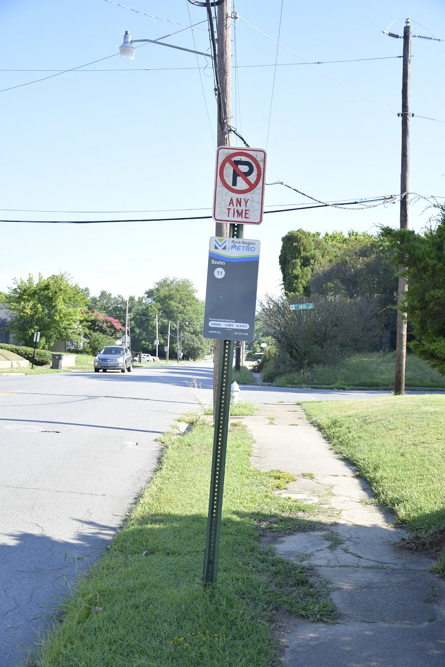 Another bus stop on the same street just a few houses down. 