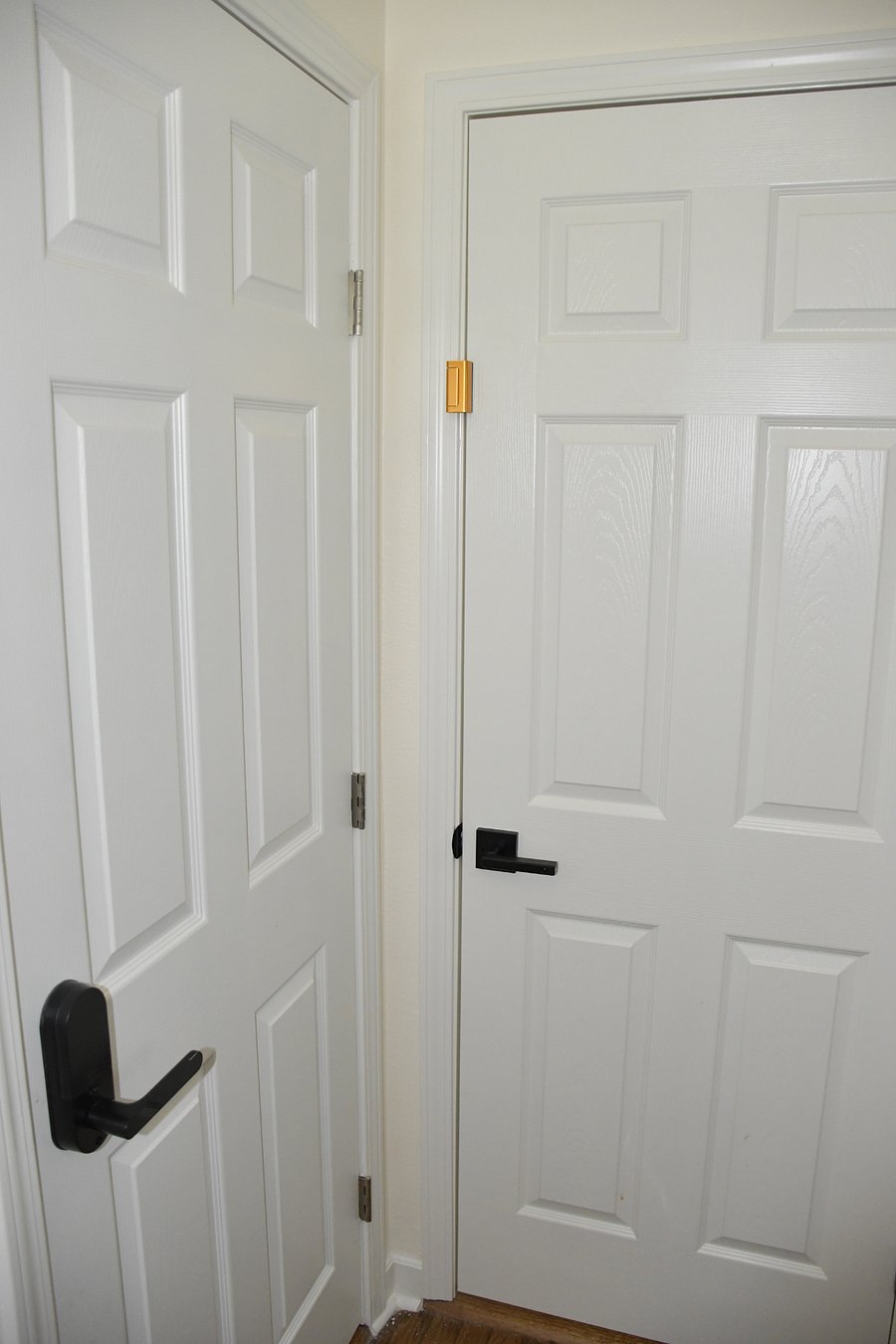 There are additional locks on the door for added security when using the shared bathroom and protecting access to a room other than your own.