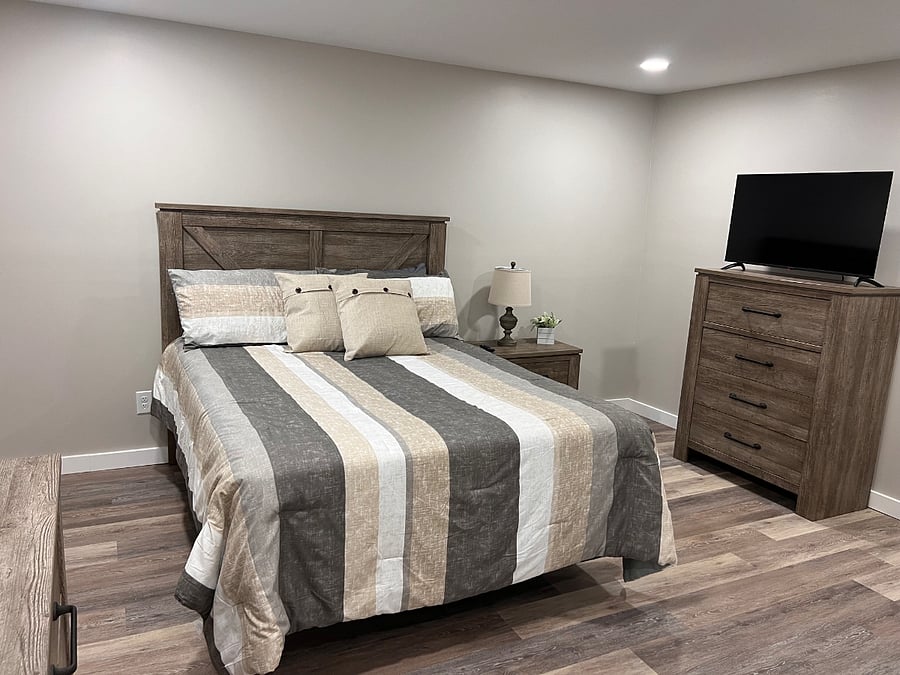 Bedroom #4 - Downstairs Dresser/Chest/Nightstand & 43 Smart TV