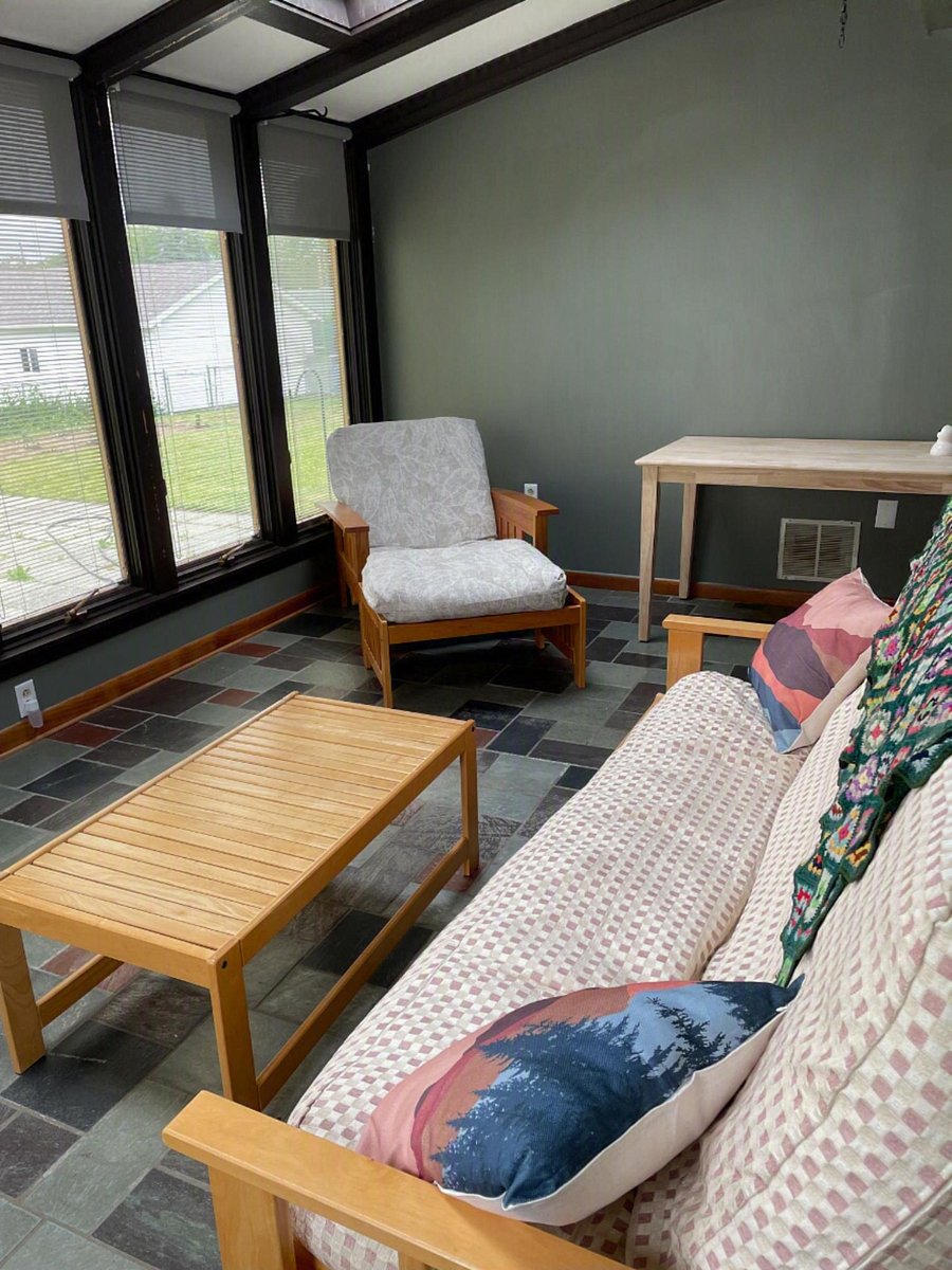 Sunroom with comfy chair and futon