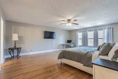 Master bedroom with desk