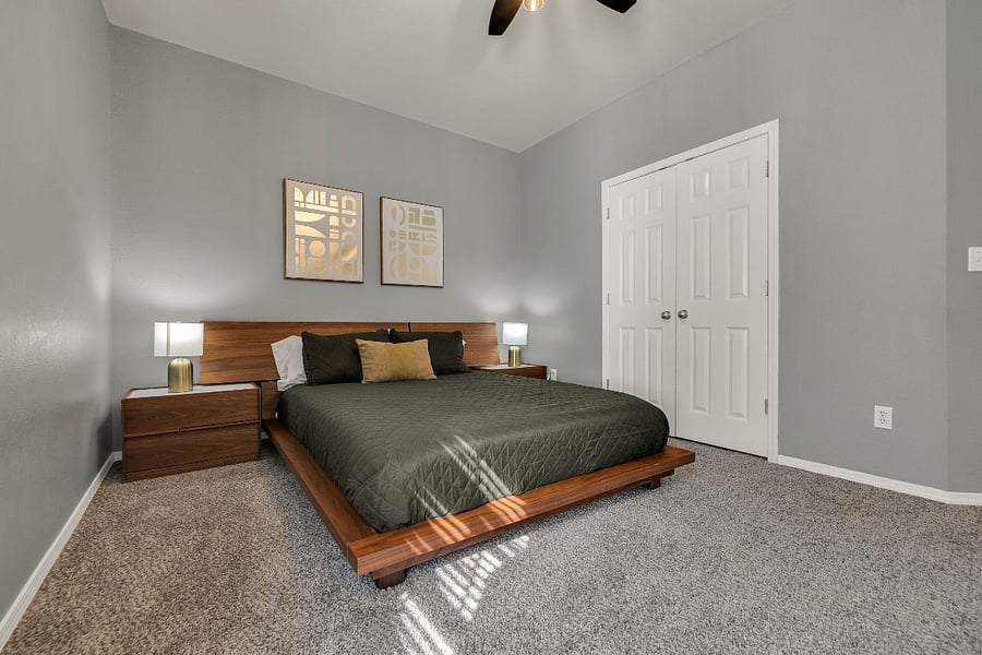 Cozy and modern bedroom with queen bed.