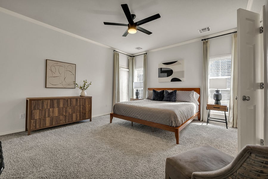 Large primary bedroom with tempurpedic mattress.