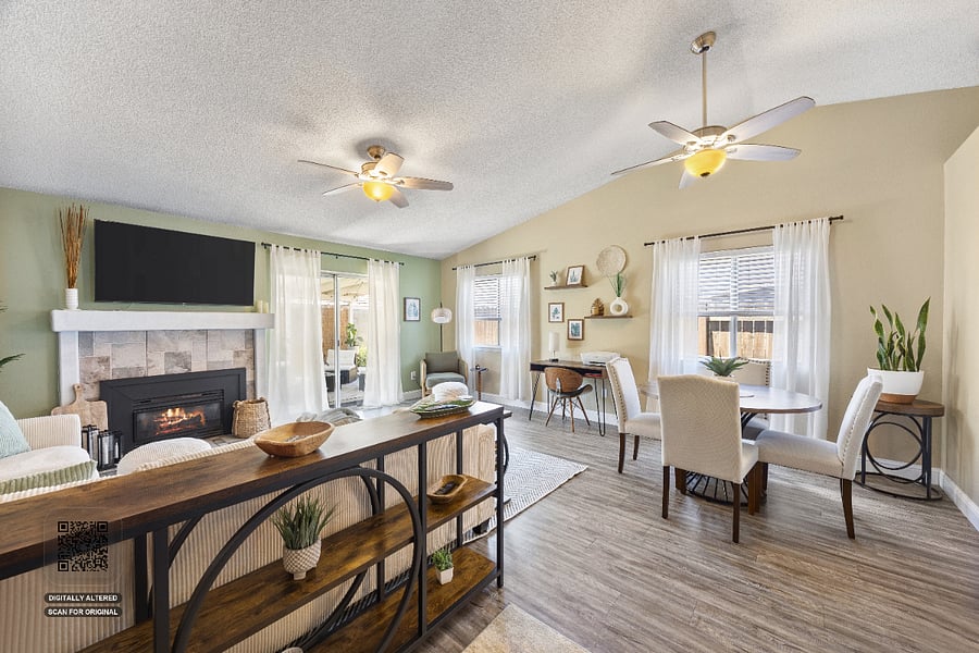 Open floor plan with main living area, dining space, dedicated workspace and reading nook