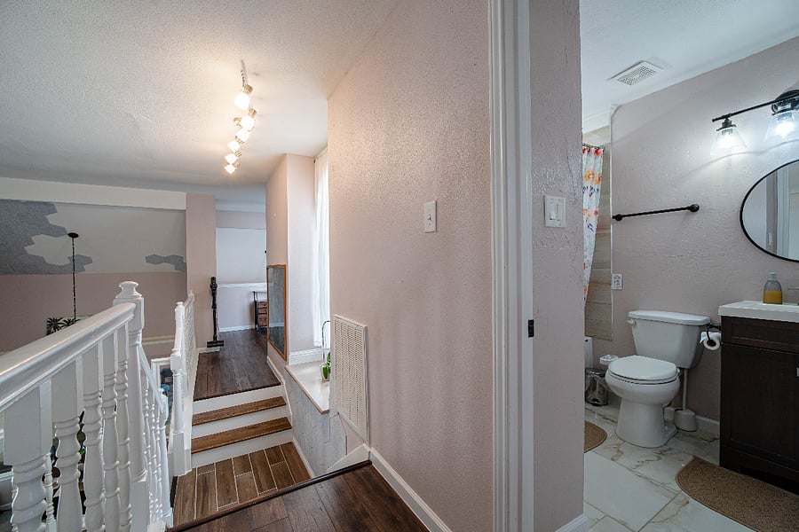 2nd floor bathroom and workspace on one side