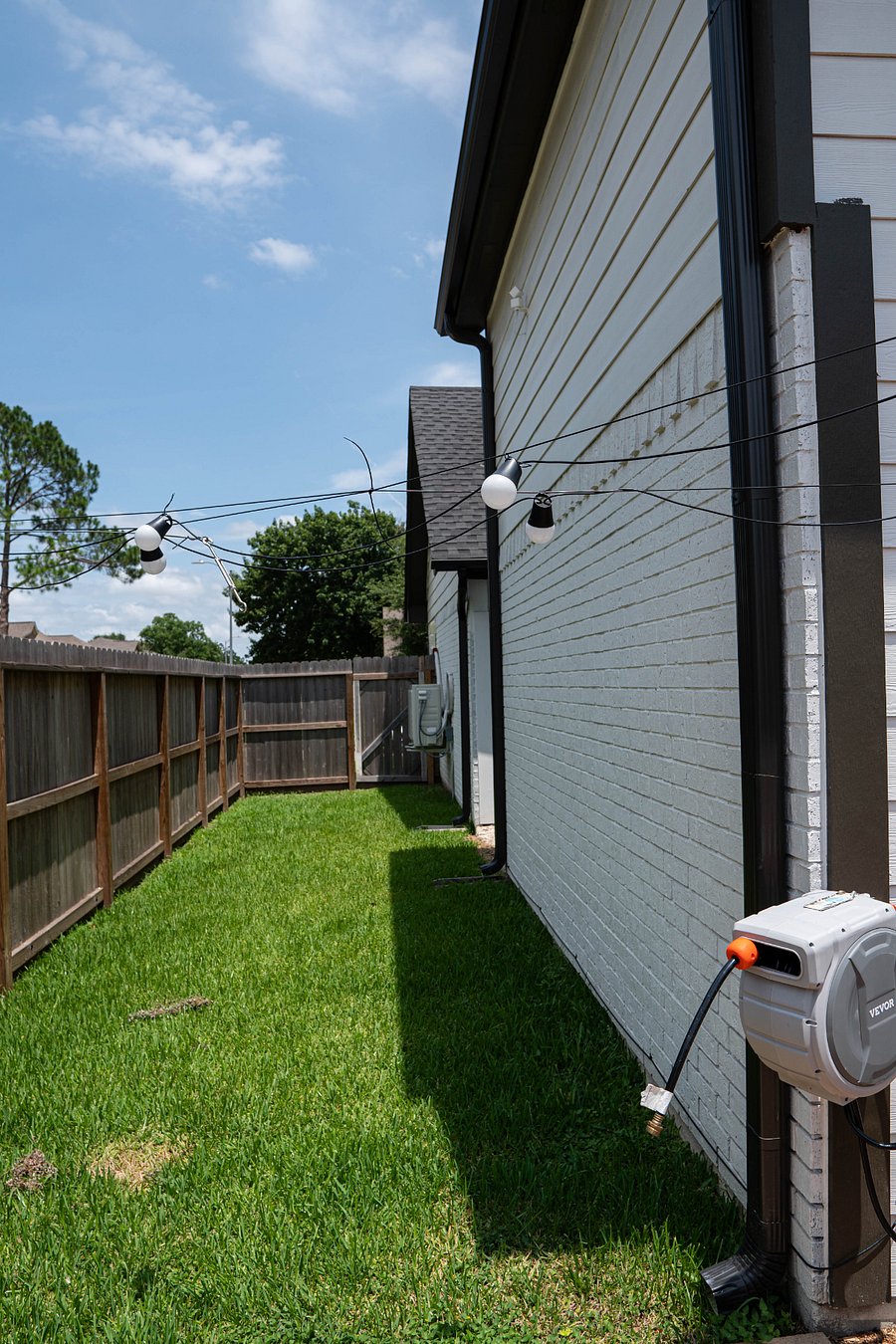 Side of the house with fence