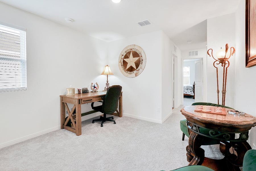 A quiet upstairs office space with a comfortable sitting area, perfect for remote work, studying, or planning your next adventure. The setup offers both productivity and relaxation, giving guests a calm place to focus during their stay.