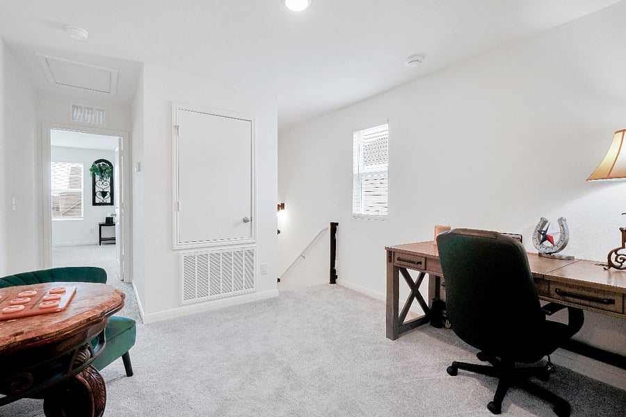 A quiet upstairs office space with a comfortable sitting area, perfect for remote work, studying, or planning your next adventure. The setup offers both productivity and relaxation, giving guests a calm place to focus during their stay.