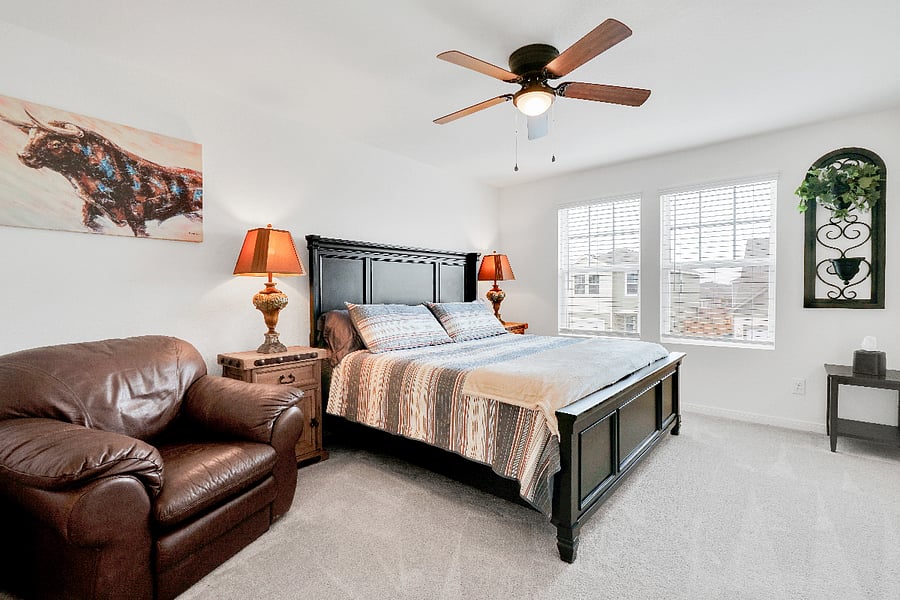 A spacious master bedroom designed for comfort and relaxation. It features a large kingsize bed, its own private full restroom, and a walkin closet for easy storage during your stay. This suite offers plenty of room to unwind and enjoy a peaceful nights rest.