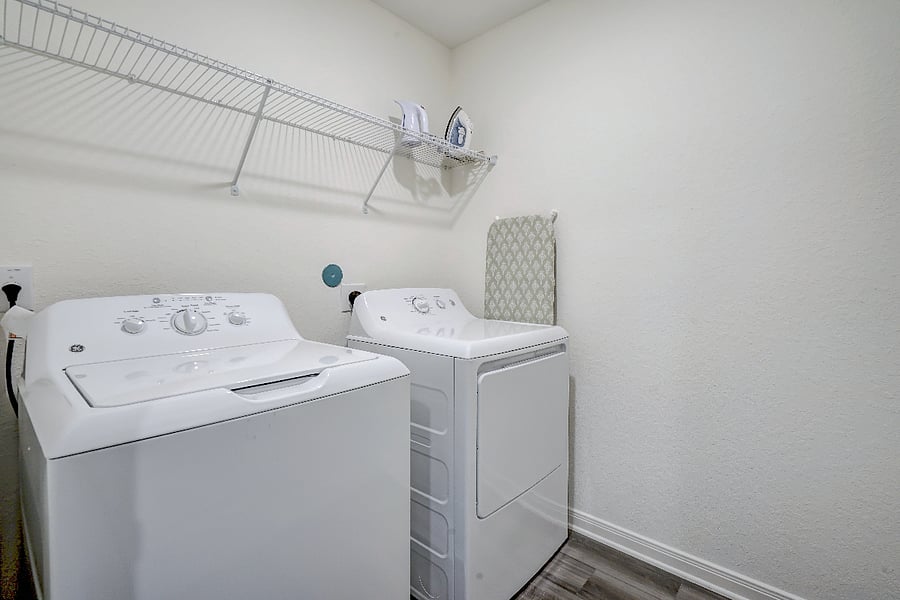 A washer and dryer are conveniently located upstairs, making it easy to keep clothes fresh during your stay. This dedicated laundry area includes starter supplies and provides simple, guestfriendly access for longer visits or everyday use.