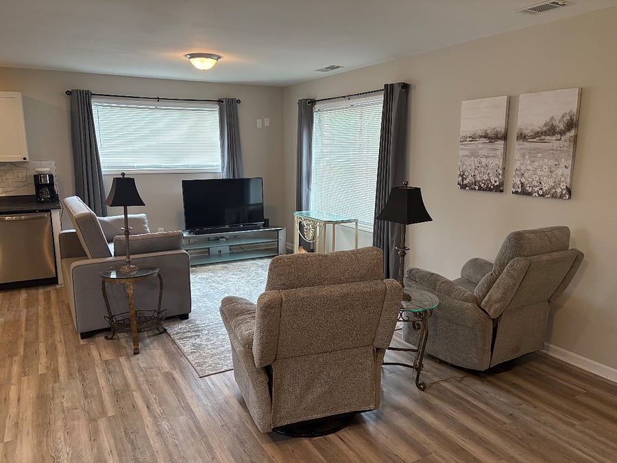 Spacious living area with new full/queen sleeper sofa, brand new recliners, smart TV. Wifi is included