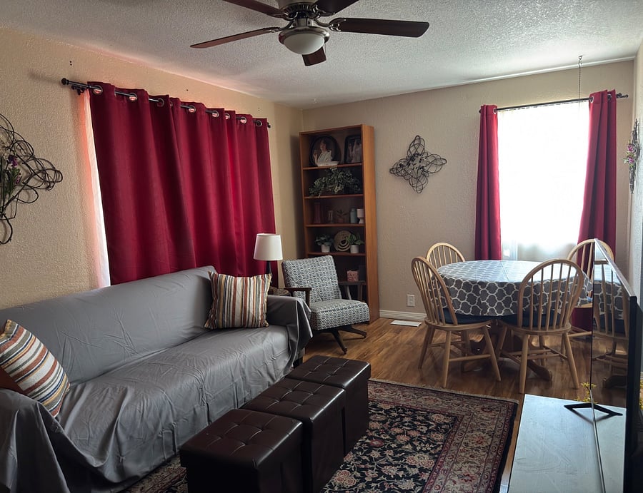 living room.  couch, chair, shelves, table
