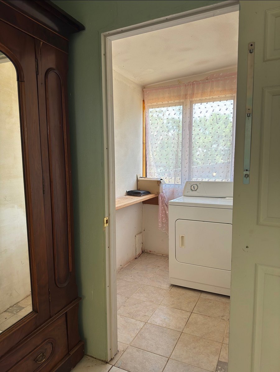 extra back room area.  dryer and storage