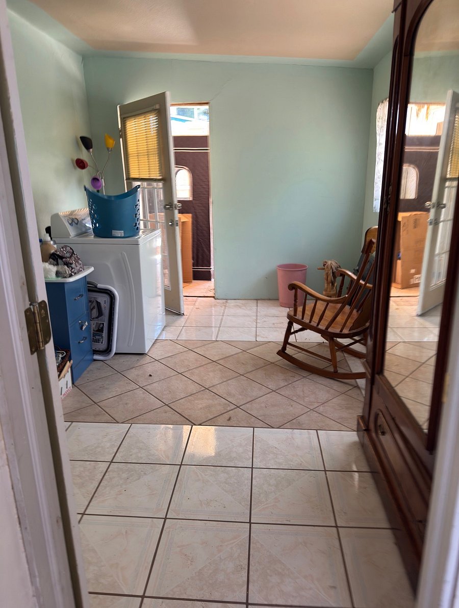 extra back room (100 sqft).  laundry, wardrobe, storage