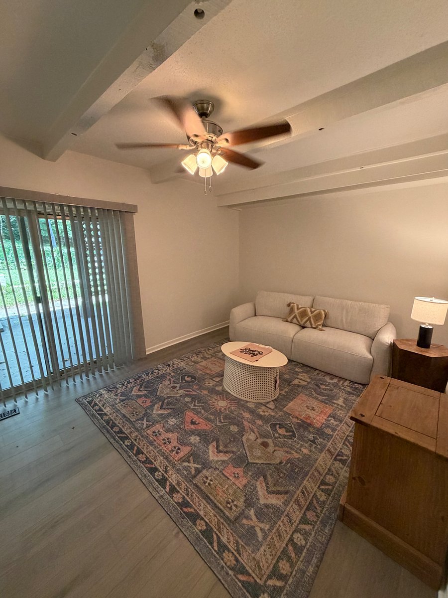Lower level den with large exterior patio