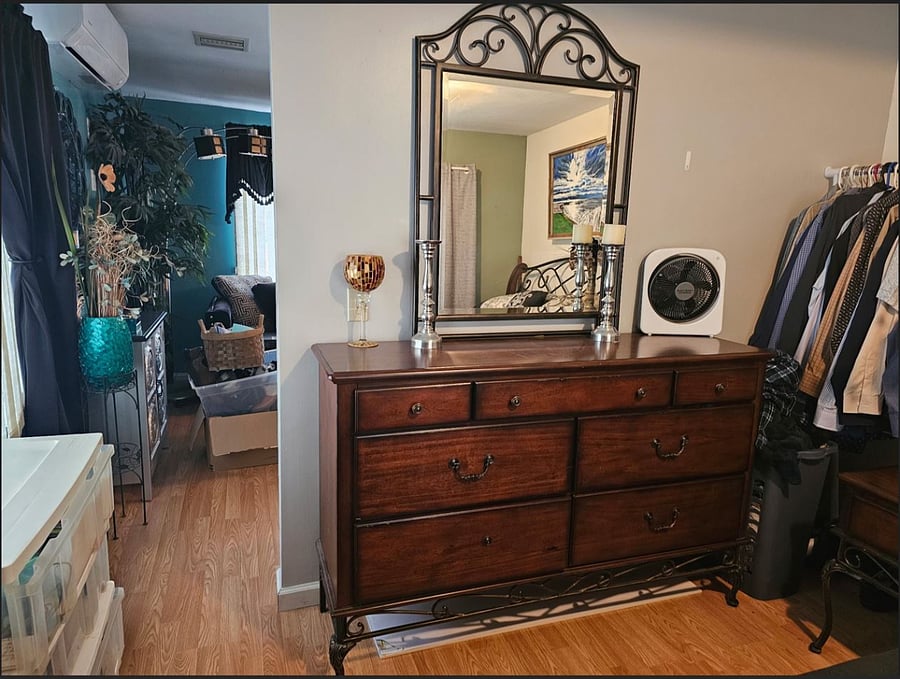 Large mirrored dresser and clothes rack