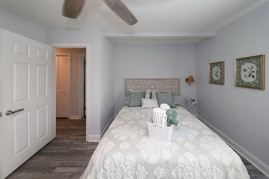 The Sea Glass Room another view Prop up the pillows on your cozy Queen bed, turn on the wall-mounted TV, and enjoy some well-deserved downtime. This view shows off the quiet, relaxing layout that makes this room a guest favorite
