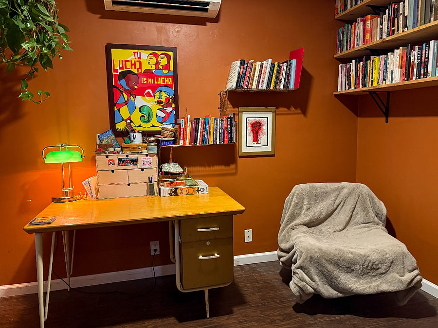 First-floor office space behind the kitchen. Lots of books: mix of non-fiction, short stories, essays, and contemporary novels. 