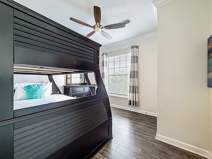 Double the fun, double the comfort - our bunkbed room keeps everyone close and cozy.