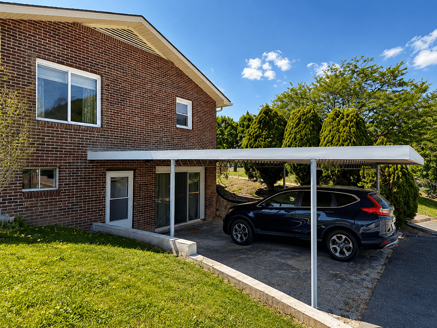 Carport , and additional parking in driveway 