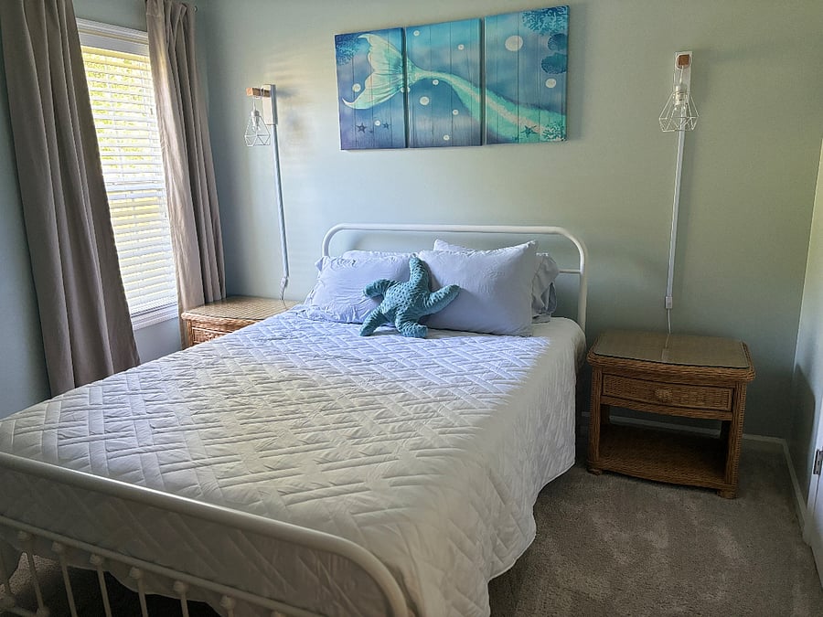 Queen bedroom with night stand x2, dresser and TV