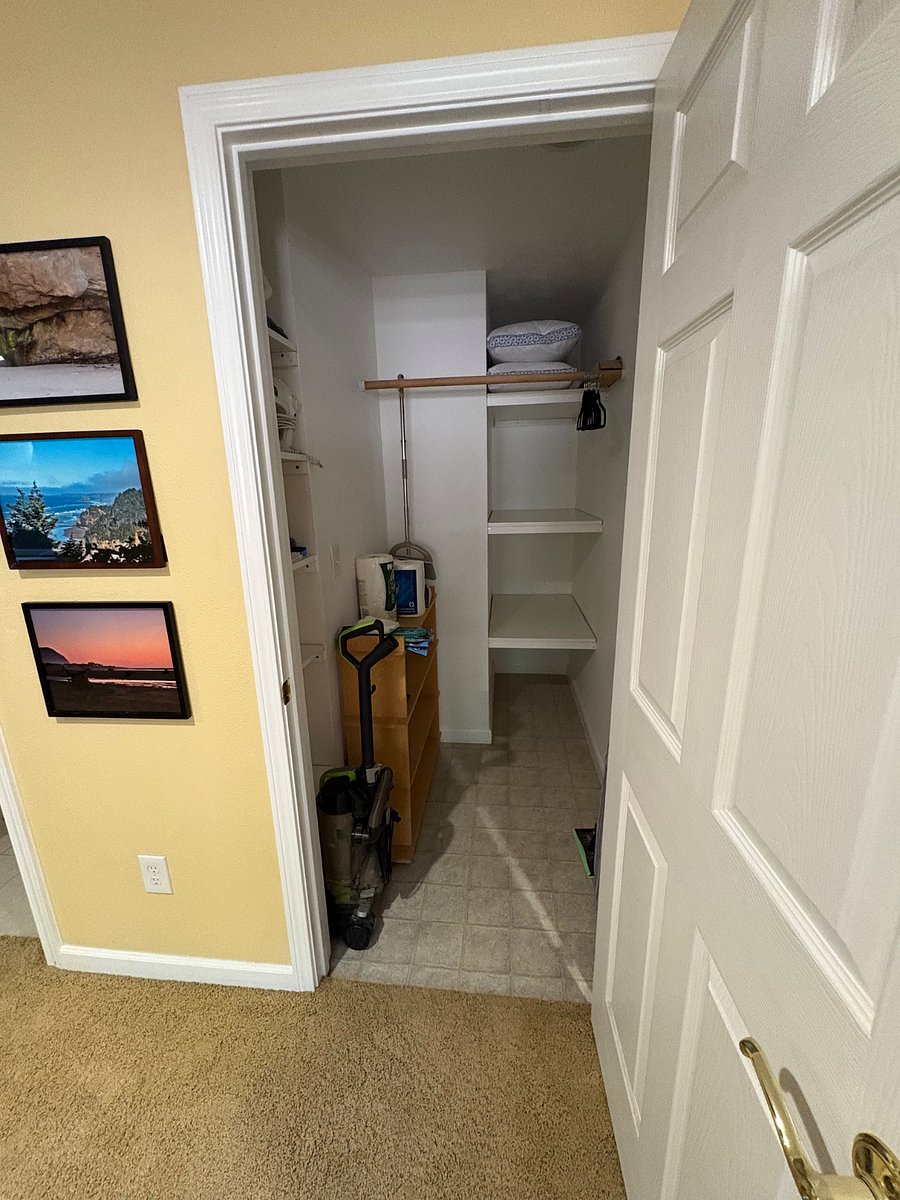 Extra large storage closet with other necessities and cleaning items