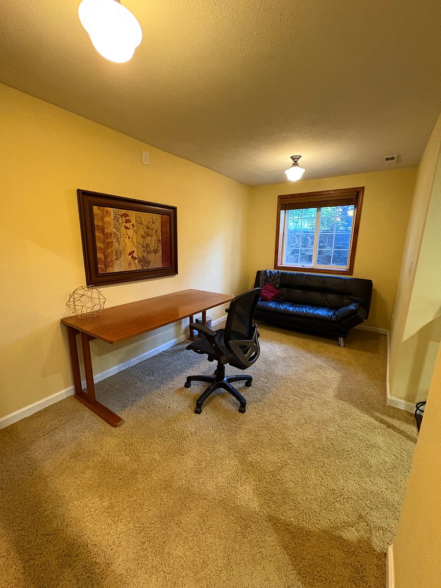 Office and guest room area with egress window