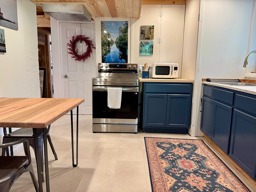 New electric oven. Microwave and cabinet space.