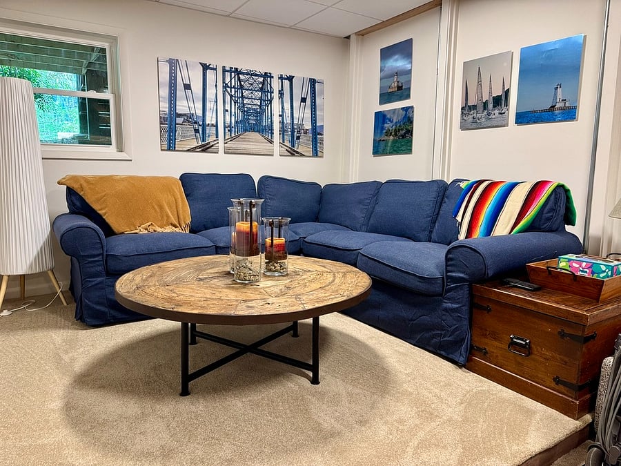 Comfortable and cozy sectional couch in living room.