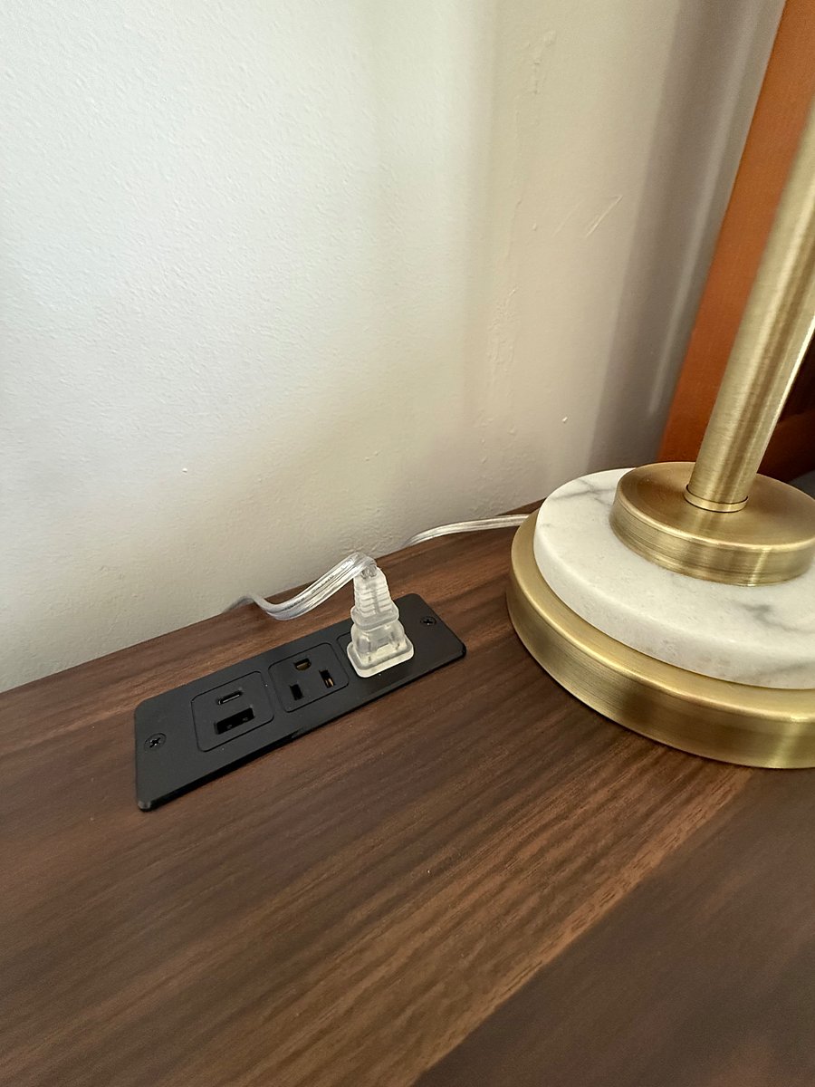 Each bedroom has two nightstands with charging capabilities.