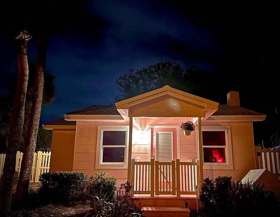 Flamingo Bungalow glowing at duska beautifully restored 1946 pink beach cottage tucked along a quiet residential street near the beach, dining, and nightlife.