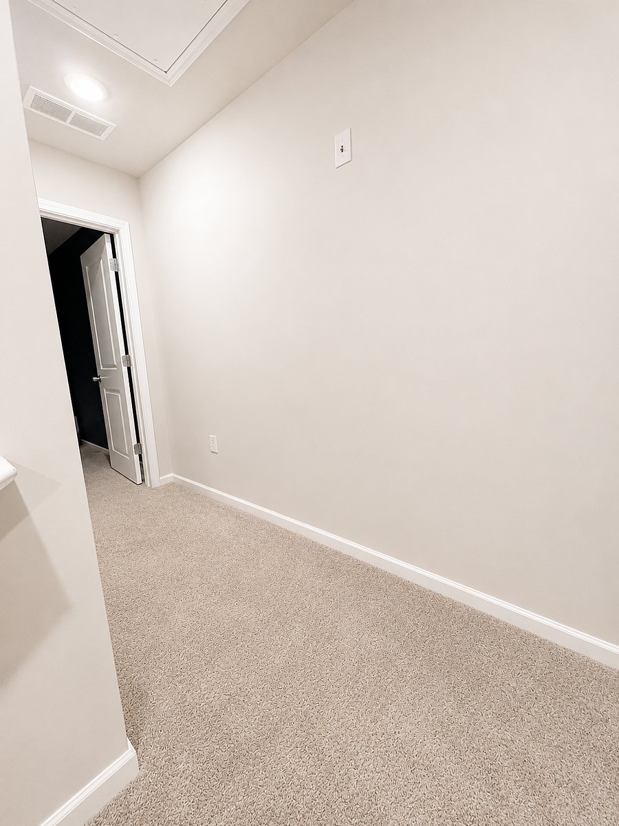 hallway leading to Master bedroom and Laundry room (to the left)
