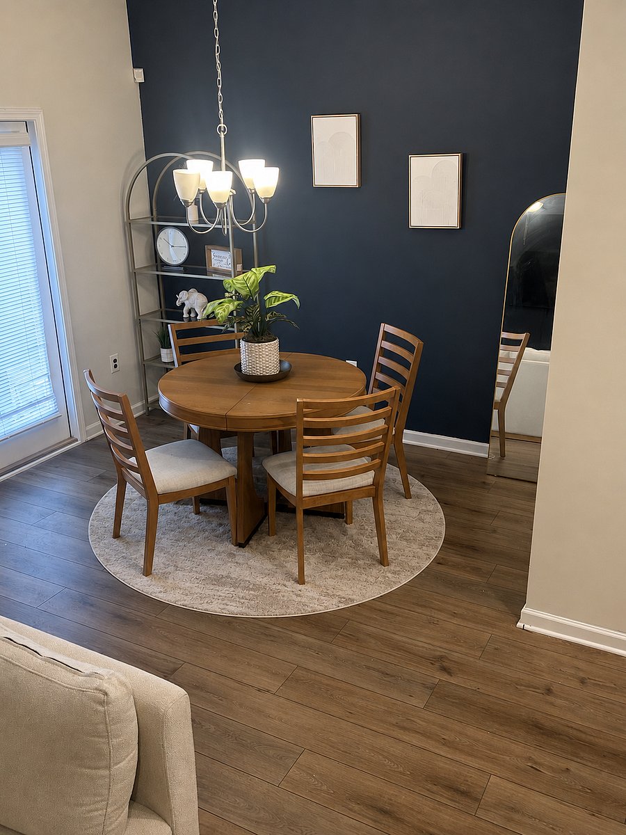 dining area seats 4 with 3 bar stools available at counter.