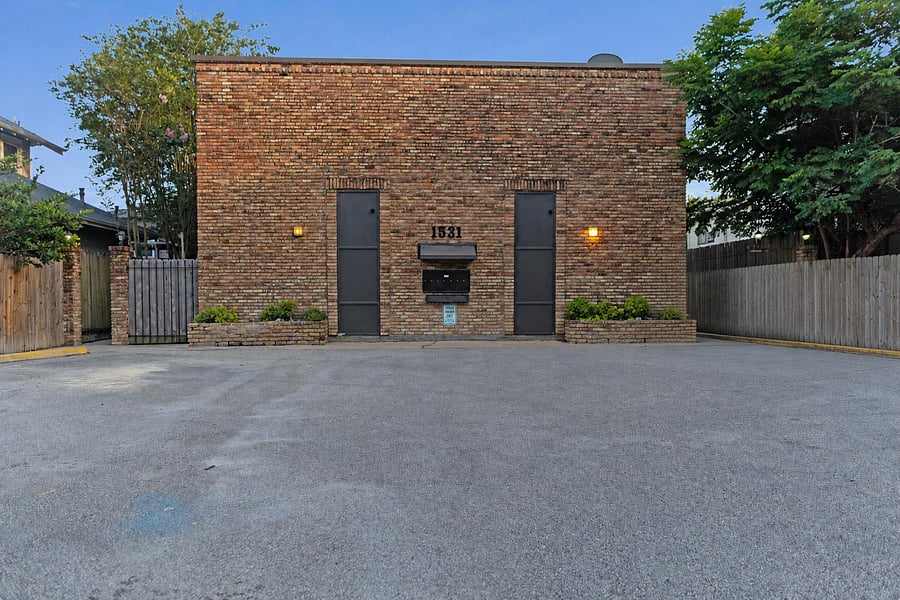 To reach our townhome, please use the walkway to the right. Parking space #6 is also located on the right.
