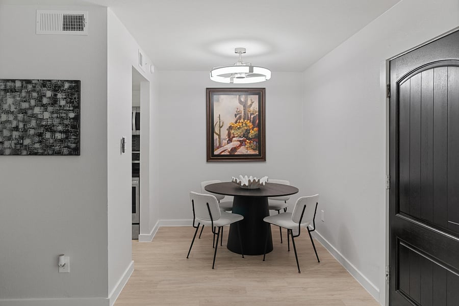 Dining table seats 4. Flows right into the kitchen for easy serving.