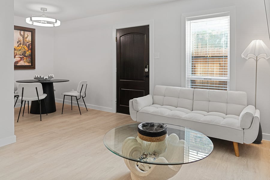 The furor can fold down in case you have a +1 staying with you. Living room & dining room flow together.
