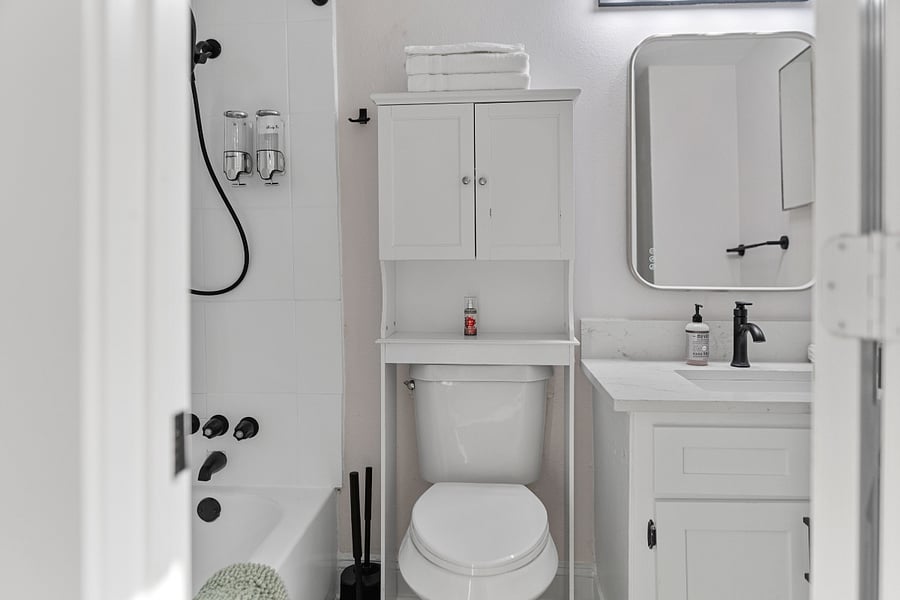 The restroom is located upstairs with the bedroom.