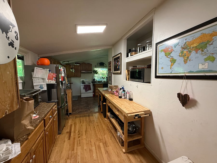 Photos were taken while we were still living in our home. All personal belongings will be removed and the home will be move-in ready for the August 12 start date.