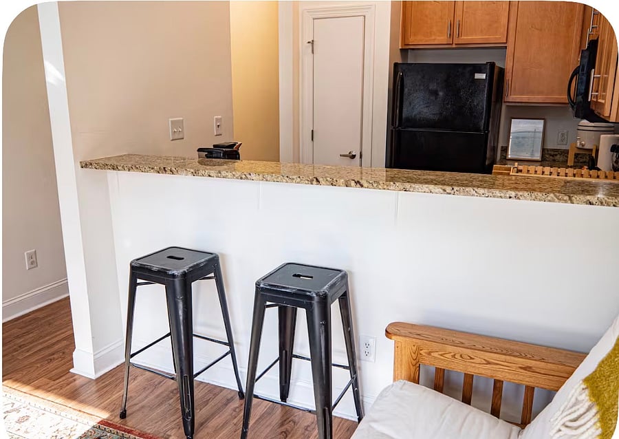 granite countertops barstools perfect place for a snack or sitting with your laptop or while you're cooking, you can watch television