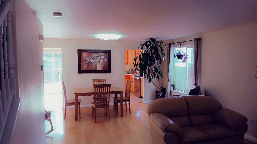 Dining room, with kitchen behind it.