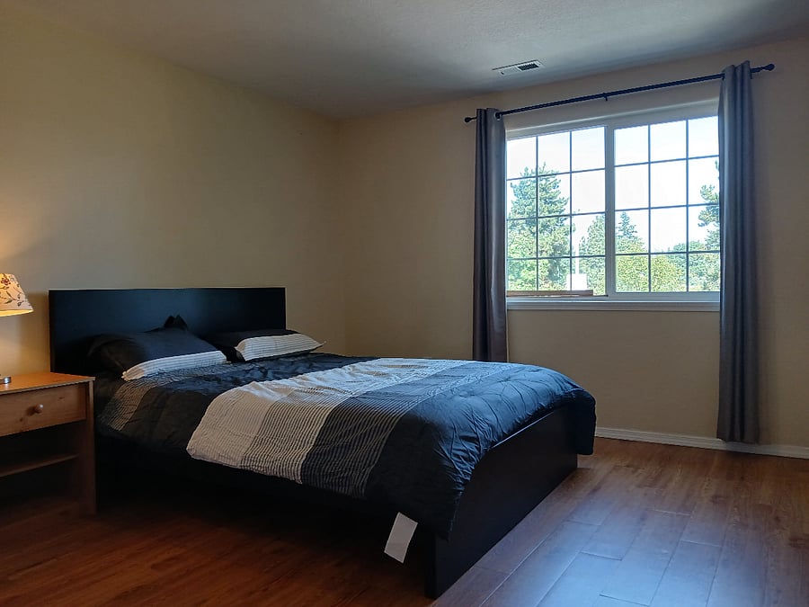 Master bedroom suite, with view of bike path.