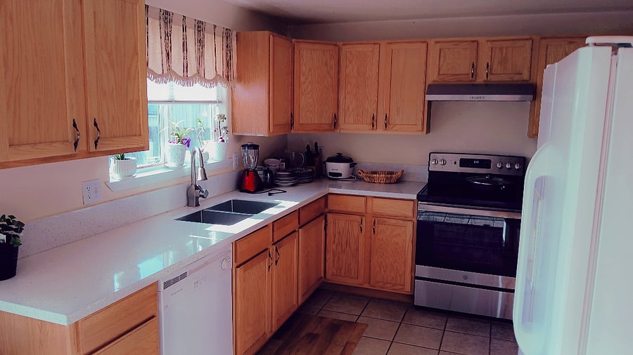 Kitchen, seen from by the back patio door.